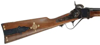Model 1859 Sharps Cavalry Carbine,
.54 caliber, 22" barrel,
color case hardened, blued steel, walnut, saddle ring,
tacks and coins added, used, by Armi Sport